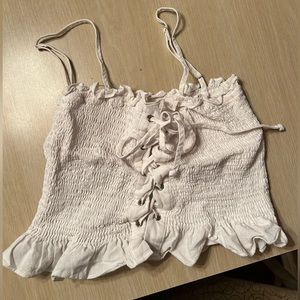 white cropped tank going out top